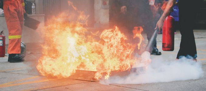 Employees Putting Out Fire