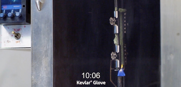 The vertical flame test shows a glove made of Kevlar not igniting or burning, while a glove made with HPPE ignites and continues to burn during a 12-second testing time. (DuPont Nomex photo)