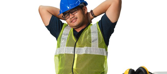 Construction Worker Stretching Muscles