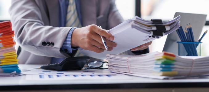 Employee Organizing Paperwork