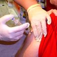 Image of someone getting a flu vaccination