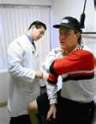 doctor treating injured worker