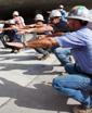 The morning routine for Baker Concrete Construction Inc. coworkers involves stretch and flex and Mission Task Analysis.