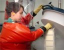 This CDC photo shows a Special Pathogens Branch researcher at work in a Biosafety Level 4 laboratory.