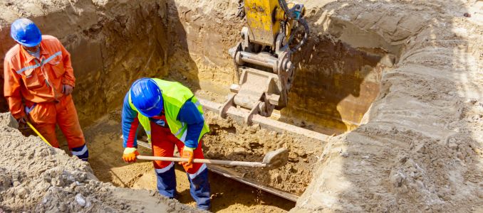 Workers in a Trench