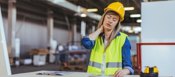 Female in Hard Hat with Neck Pain