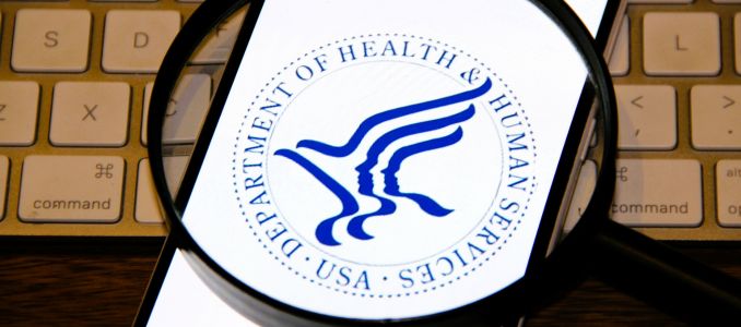 Health and Human Services with a Magnifying Glass