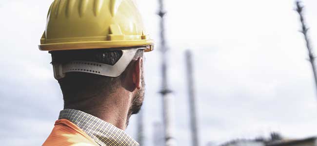 Considerations for Choosing Head Protection: OSHA Compliance, Hazard Assessments, and Technology Advancements